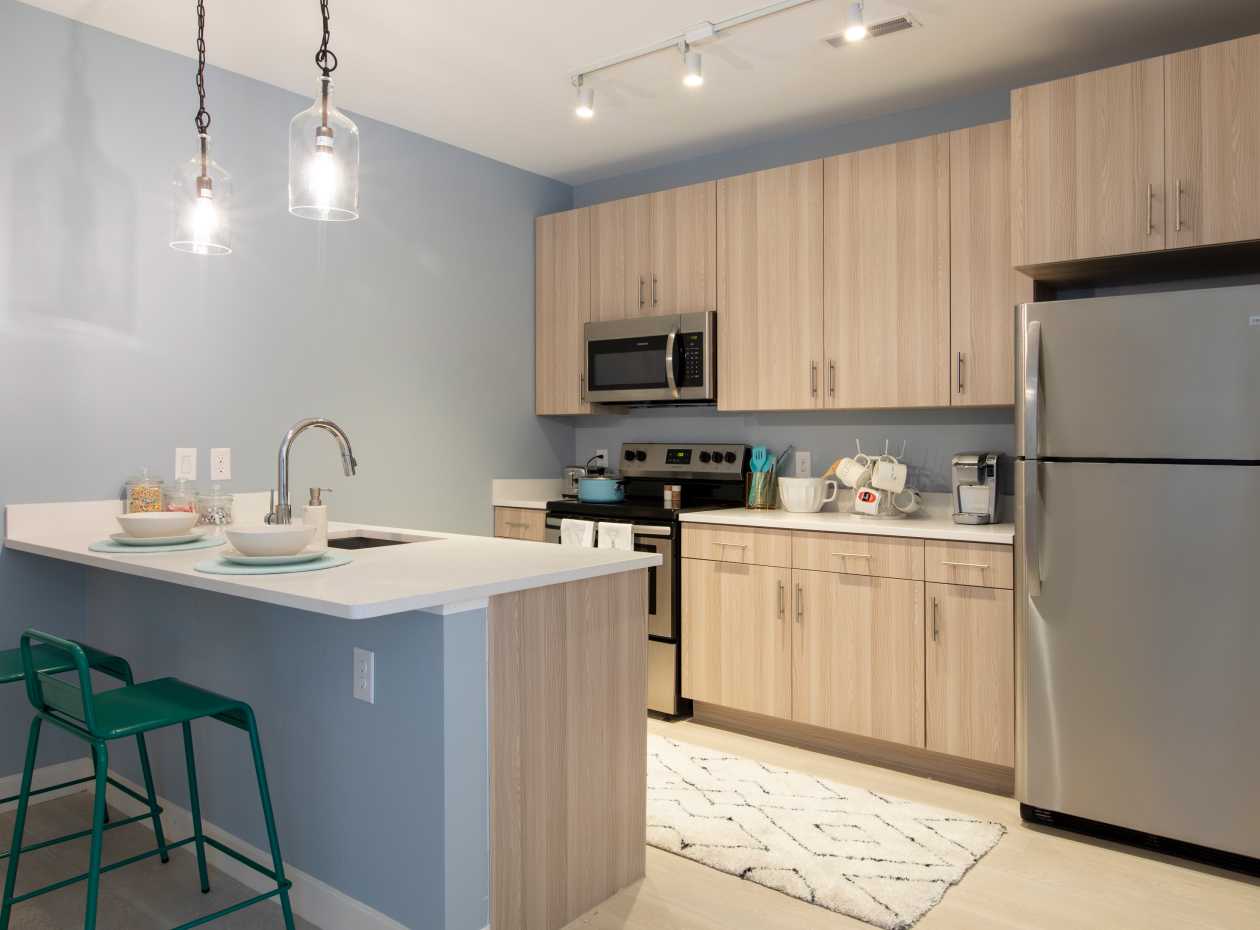 A kitchen with stainless steel appliances